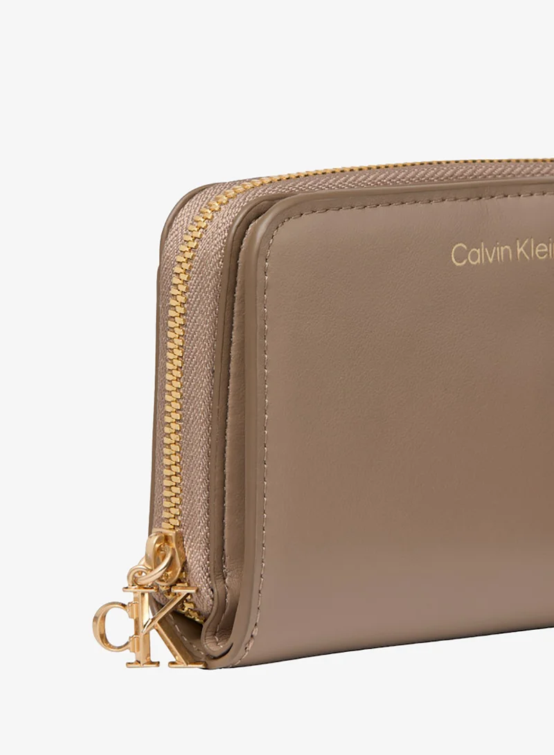 CALVIN KLEIN  Zip Around Flap Wallet for Women | Best Price UAE